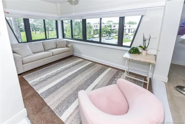 a view of living room and kitchen