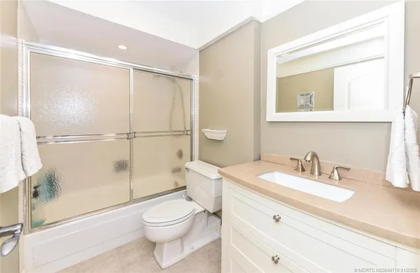 a room with a bed and a table