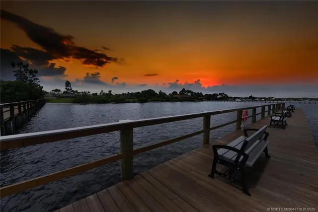 a view of wooden floor with a lake view