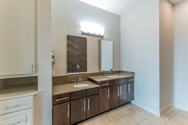a bathroom with a bathtub and shower