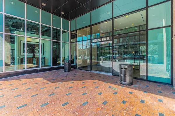 a view of a backyard of a house with a garden