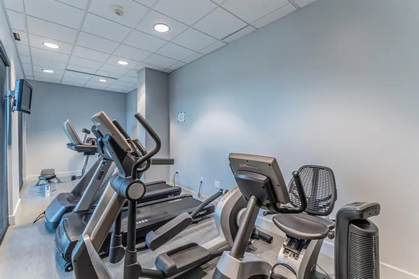 a view of a backyard with furniture