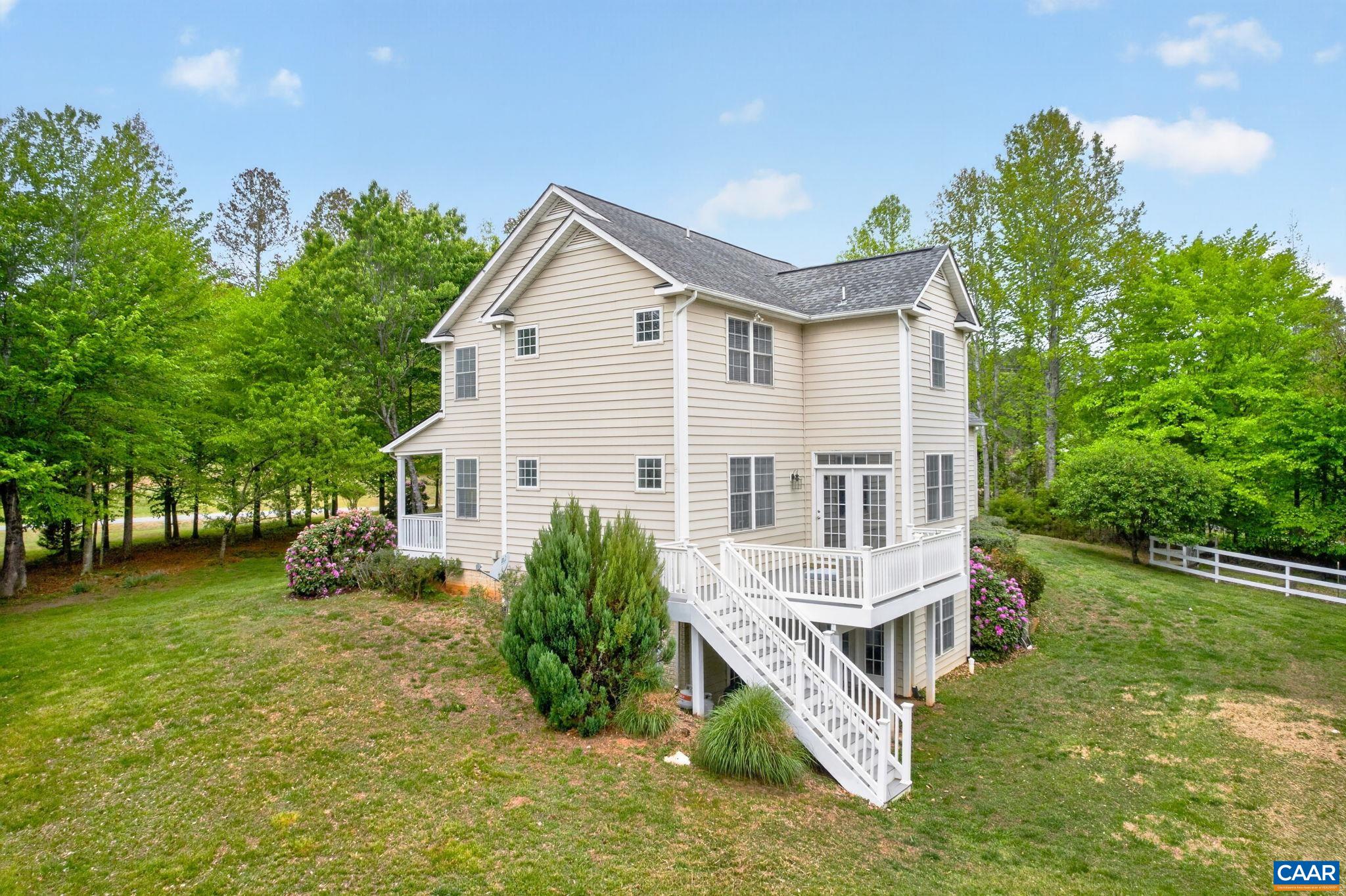 511 Taylor Ridge Way Palmyra, VA 22963 - Photo 51 of 57 a view of a house with a yard and sitting area