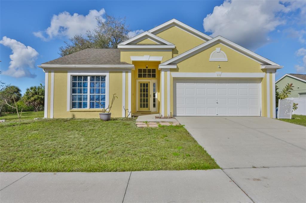 219 Island Water Way Apollo Beach, FL 33572 - Photo 1 of 34 front view of a house with a yard