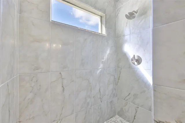 a en suite bathroom with a shower