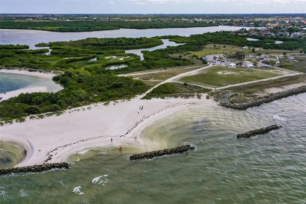 219 Island Water Way Apollo Beach, FL 33572 - Photo 33 of 34 an aerial view of a house with a yard and lake view
