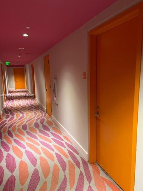 31 Southeast 6th Street, Unit 1606 Miami, FL 33131 - Photo 18 of 27 a bedroom with a bed and a mirror