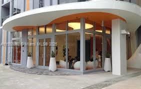 31 Southeast 6th Street, Unit 1606 Miami, FL 33131 - Photo 19 of 27 a view of a house with a porch