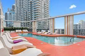 31 Southeast 6th Street, Unit 1606 Miami, FL 33131 - Photo 20 of 27 a view of swimming pool with seating space