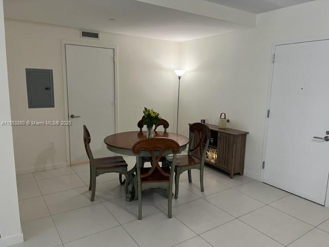 31 Southeast 6th Street, Unit 1606 Miami, FL 33131 - Photo 10 of 27 a view of a dining room with furniture