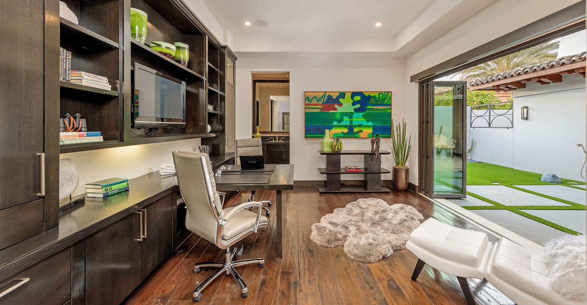 1011 Mountain Spring Palm Desert, CA 92260 - Photo 9 of 16 a living room with furniture and a table