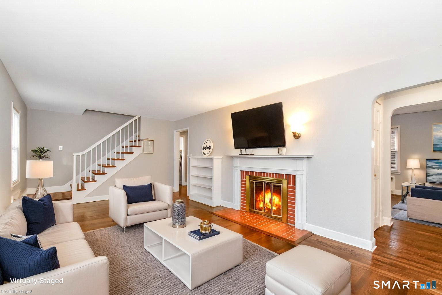 63 Park Road Hamden, CT 06517 - Photo 11 of 39 a living room with furniture and a fireplace
