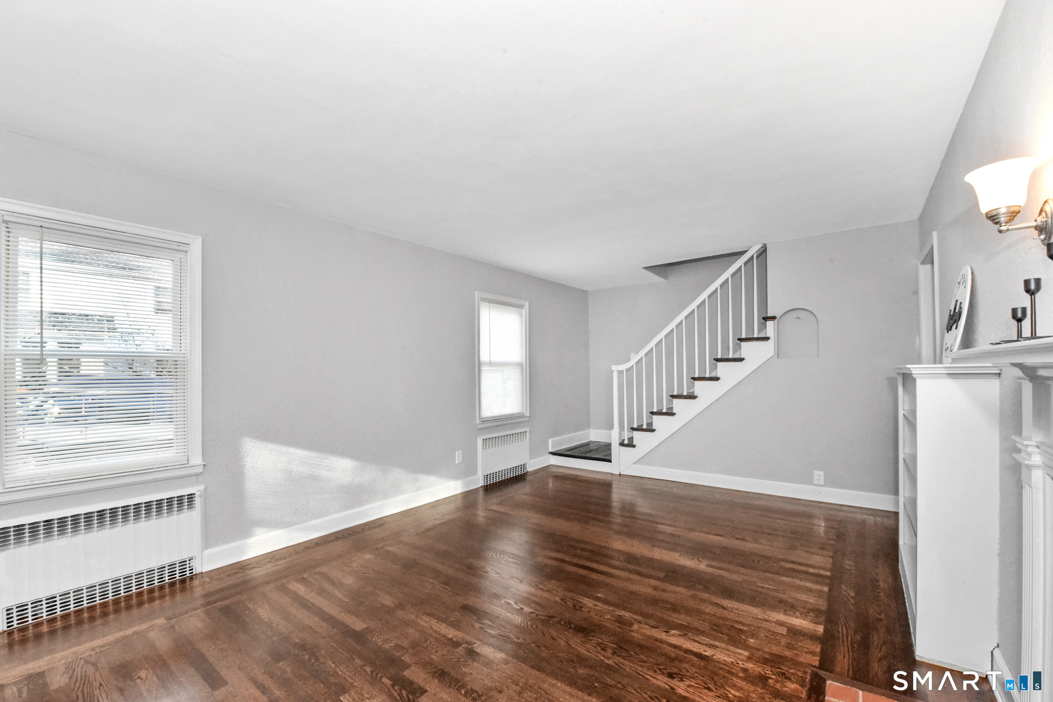 63 Park Road Hamden, CT 06517 - Photo 10 of 39 a view of entryway and hall with wooden floor