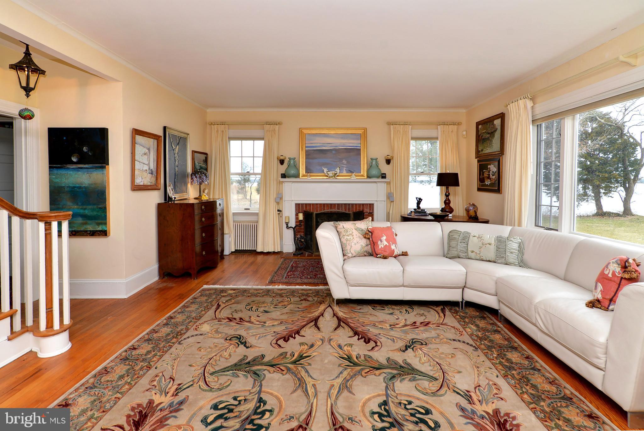 5932 Horns Point Road Cambridge, MD 21613 - Photo 22 of 46 Living Rm w/ Fireplace & Views of Lecompte Bay