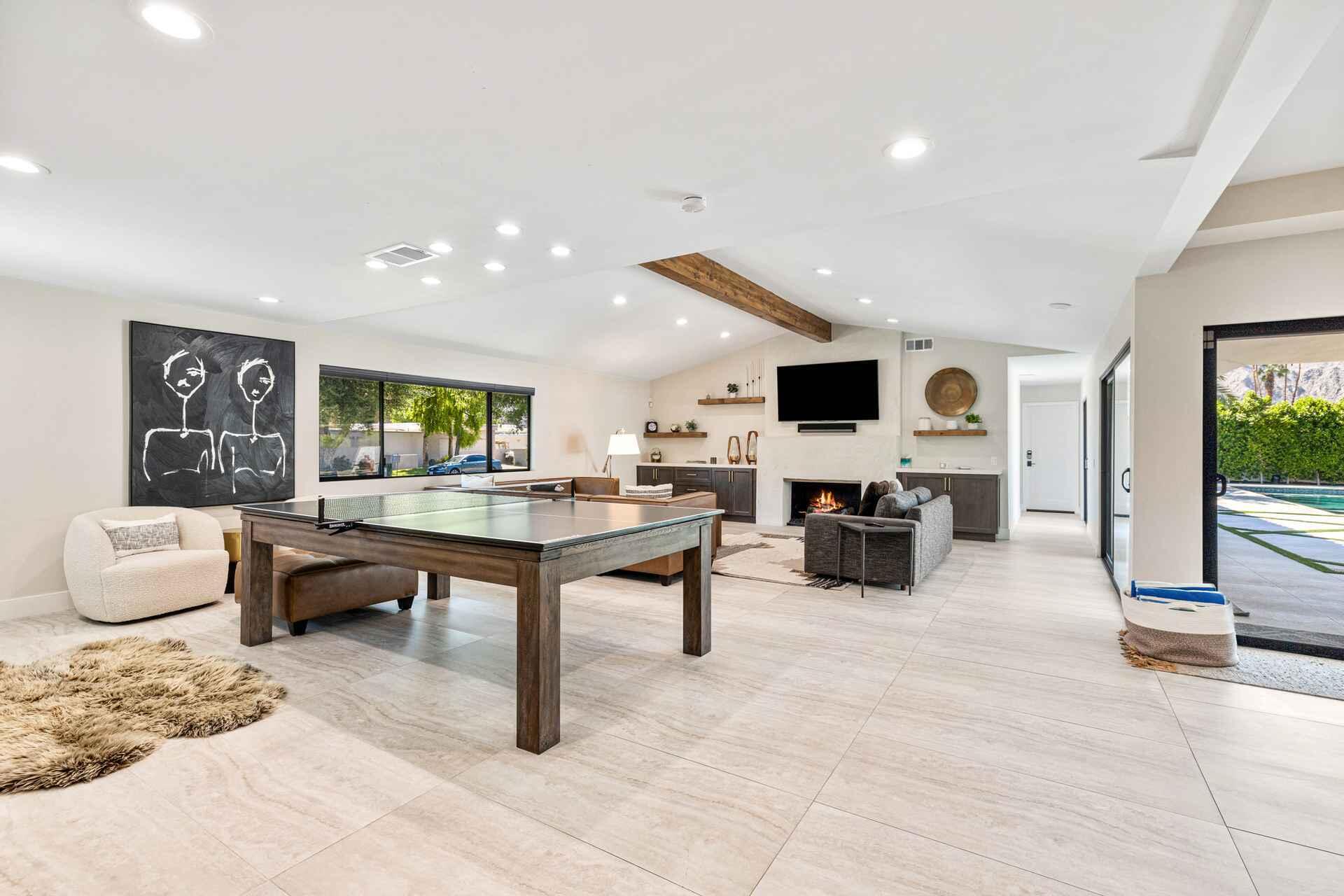 45655 Apache Road, Unit SHARE D Indian Wells, CA 92210 - Photo 25 of 31 a living room with furniture and flat screen tv
