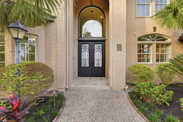 a view of outdoor space with porch and wooden floor