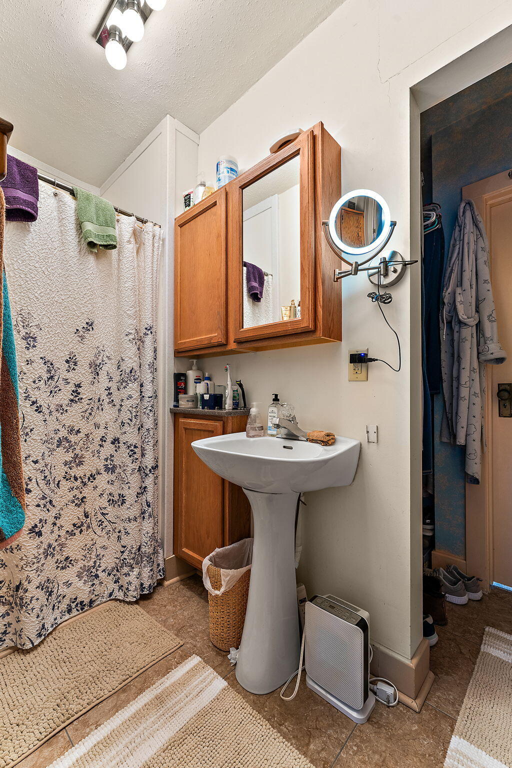 138 McClung Road La Porte, IN 46350 - Photo 13 of 50 a bathroom with a sink toilet and shower