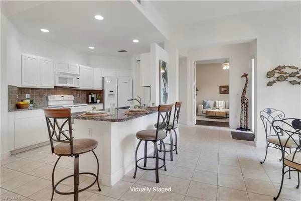 $360,000 | 994 Eastham Way, Unit V101, Naples, FL 34104