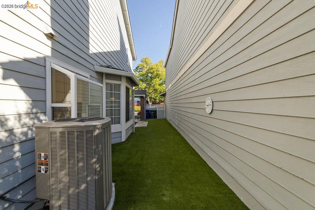 724 Winterside Circle San Ramon, CA 94583 - Photo 34 of 43 Side yard featuring artificial turf and a bay window