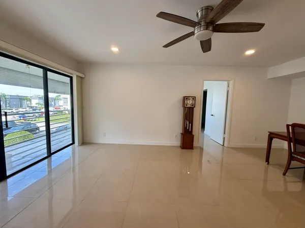 an empty room with fan
