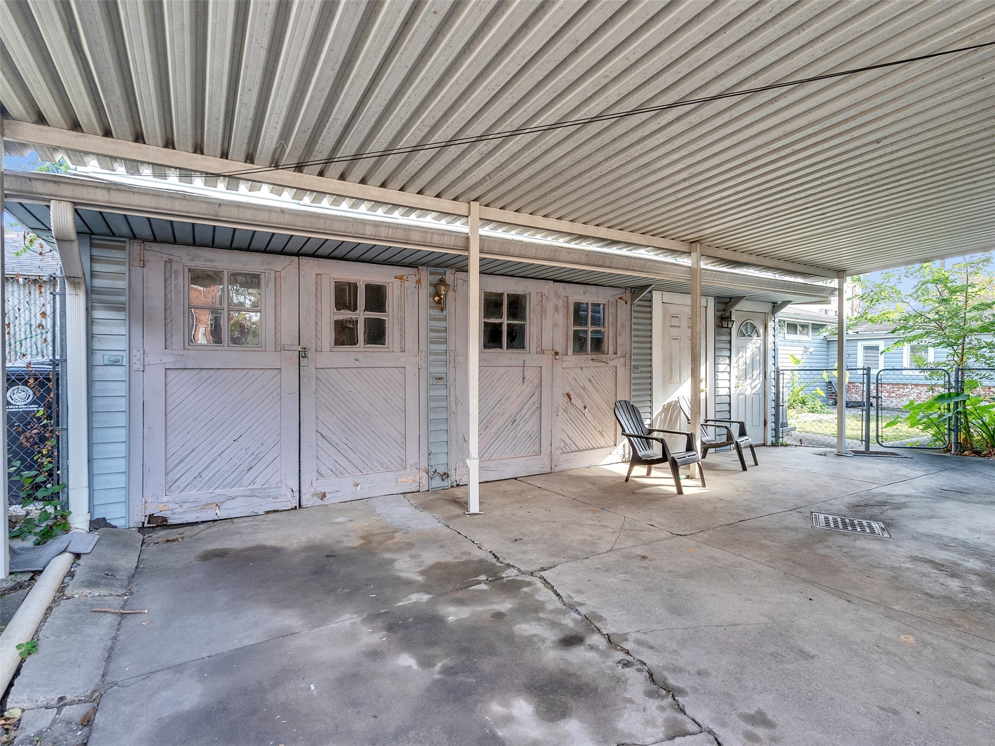 4625 Bell Street Houston, TX 77023 - Photo 30 of 33 a view of a porch with table and chairs