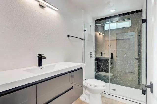 a white bath tub sitting in a bathroom