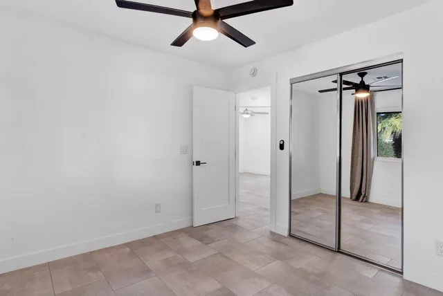 a workspace with furniture and window