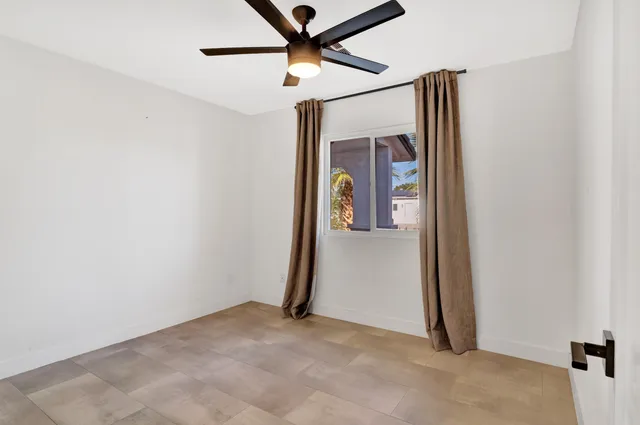 en empty room with fan