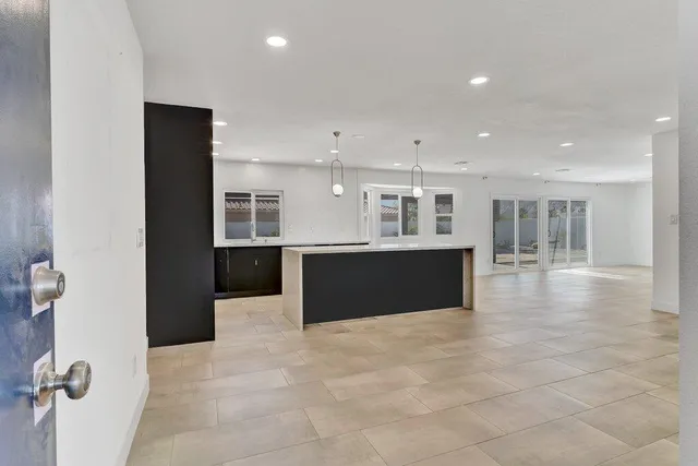 a view of kitchen with a sink