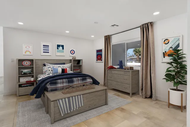 a view of kitchen with refrigerator and a sink