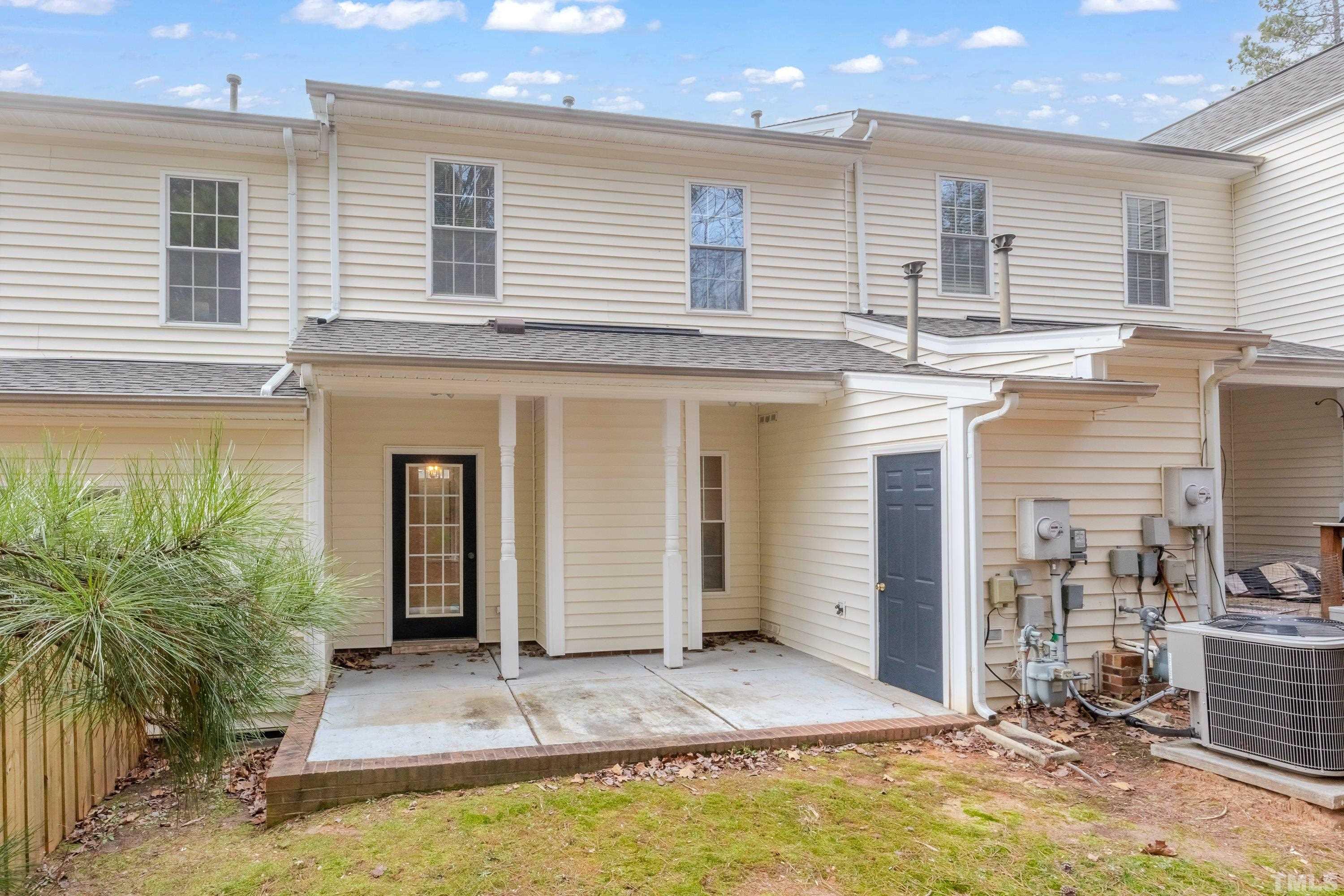 3045 Coxindale Drive Raleigh, NC 27615 - Photo 21 of 42 front view of a house with a yard