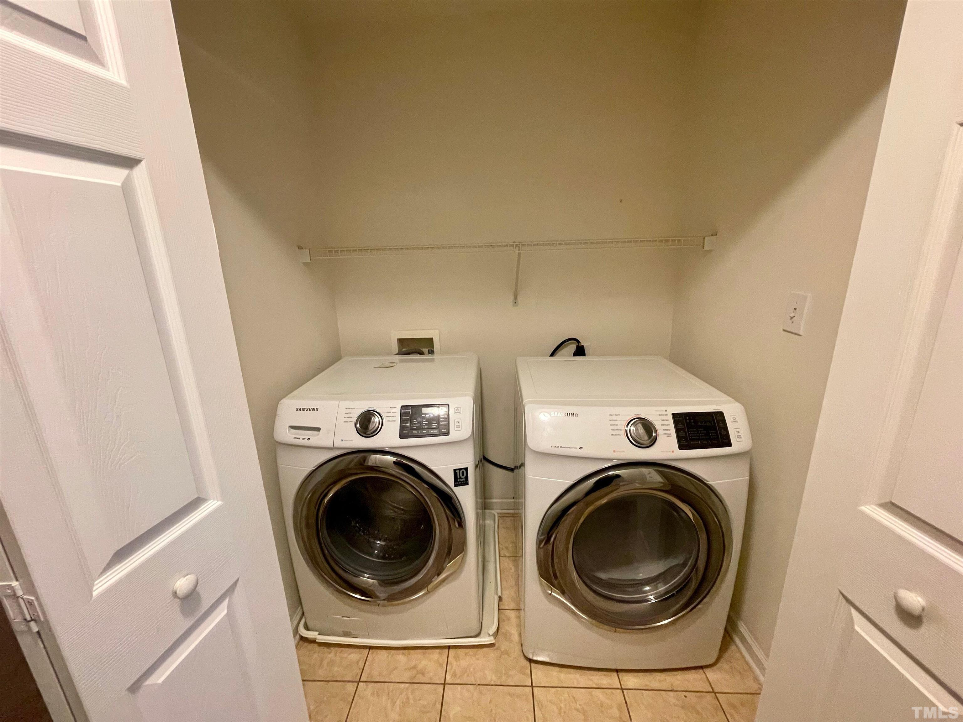 3045 Coxindale Drive Raleigh, NC 27615 - Photo 38 of 42 a utility room with dryer and washer