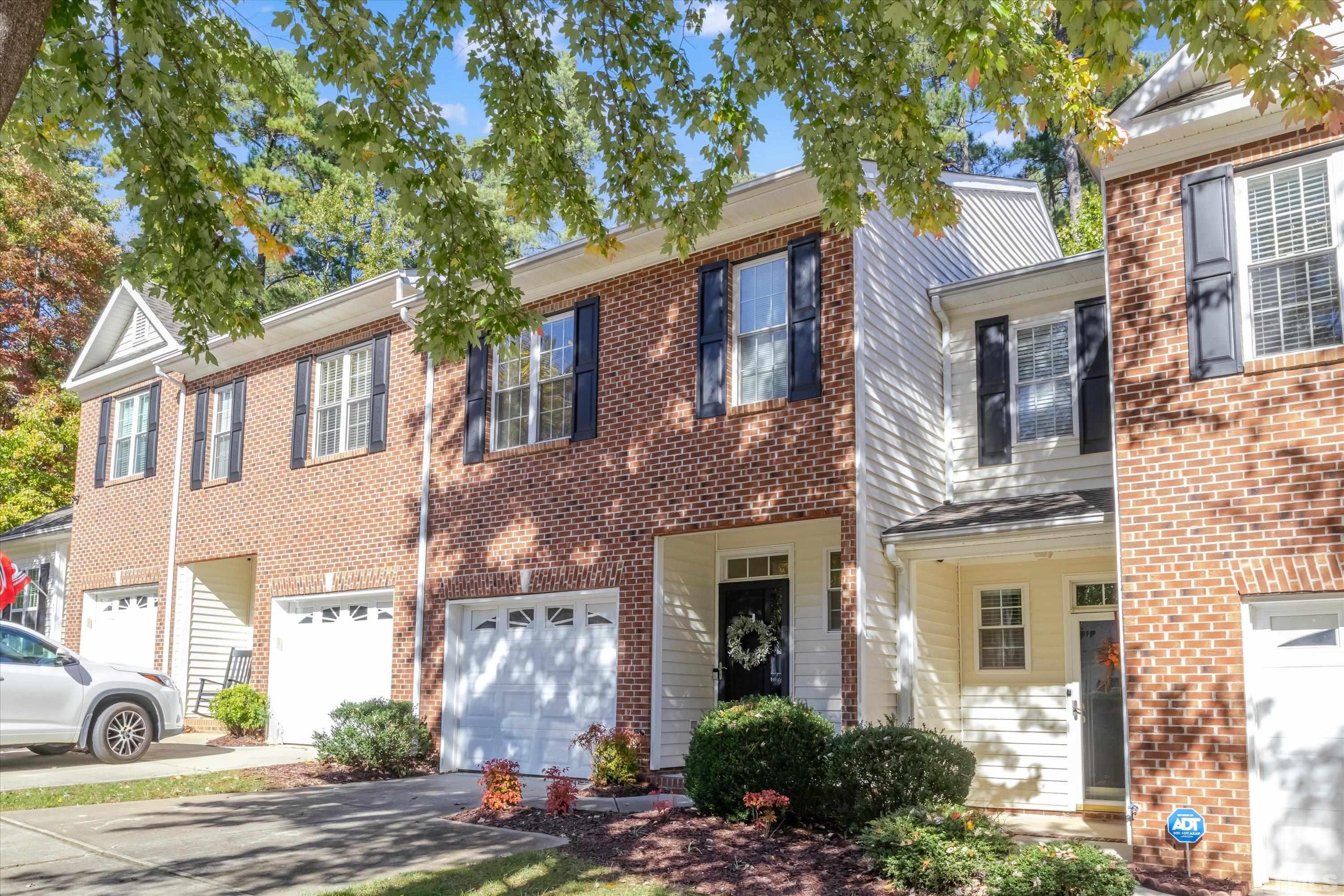 3045 Coxindale Drive Raleigh, NC 27615 - Photo 42 of 42 a front view of a house with a garden