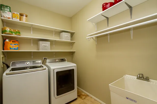 a utility room with dryer and washer