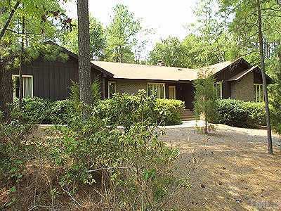 6901 Brook Ridge Court Raleigh, NC 27615 - Photo 1 of 1 front view of a house with a yard