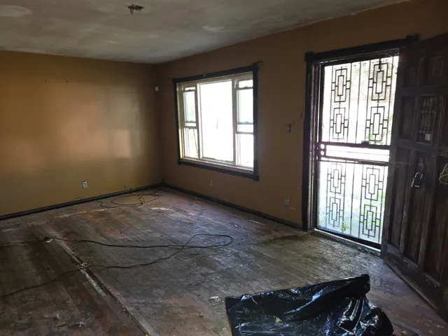 an empty room with windows