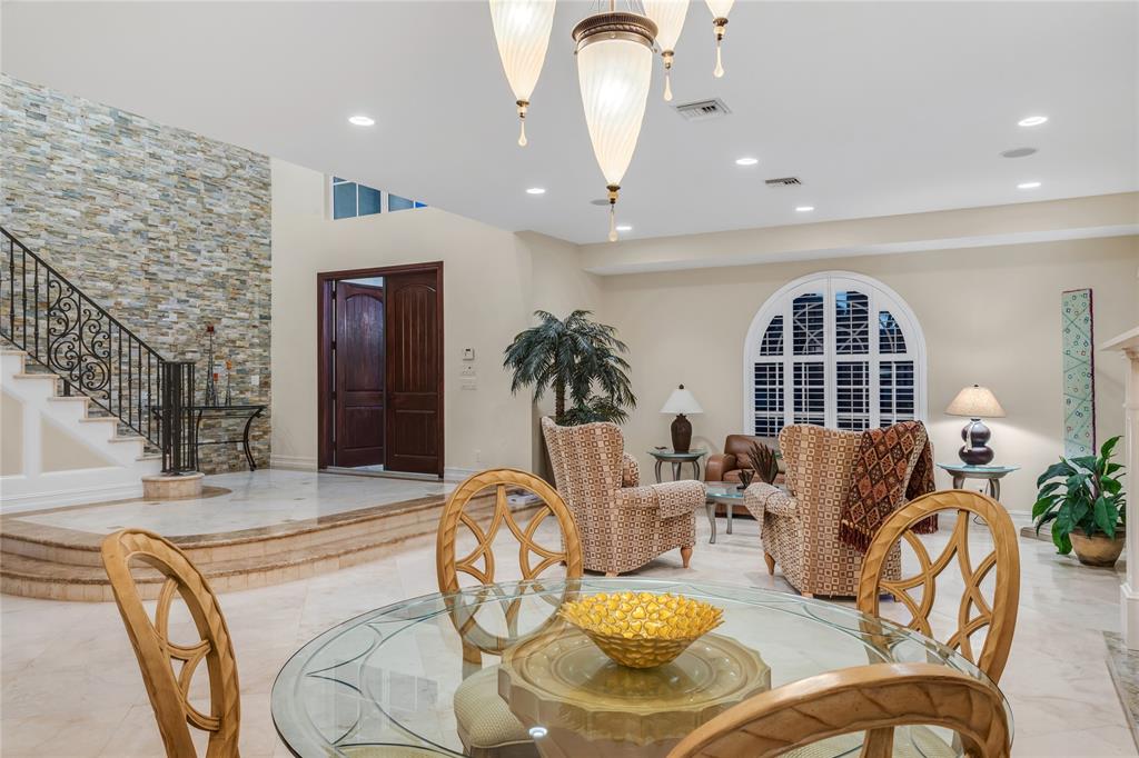 3489 Northeast 30th Avenue Lighthouse Point, FL 33064 - Photo 11 of 42 a view of a livingroom with furniture window and wooden floor