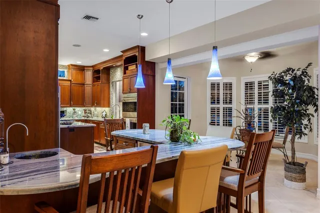 a view of a livingroom with furniture and a fireplace