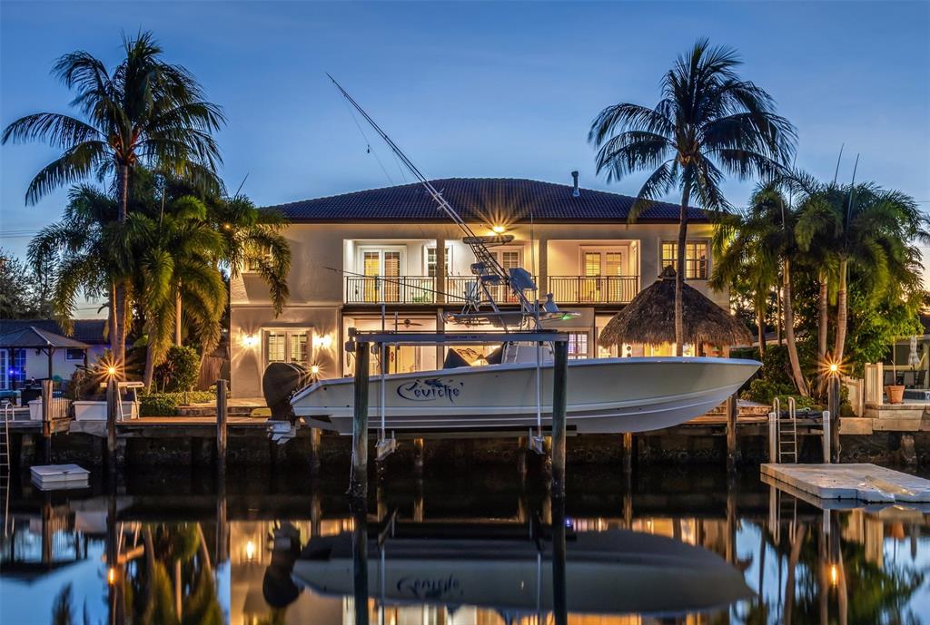 3489 Northeast 30th Avenue Lighthouse Point, FL 33064 - Photo 2 of 42 a view of a cafe with sitting area