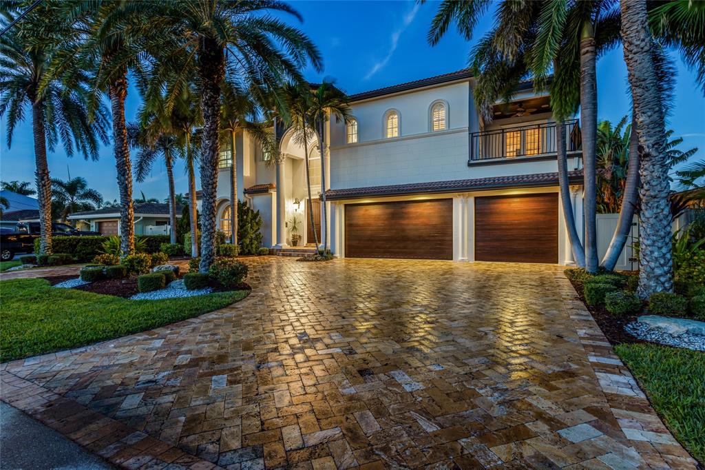 3489 Northeast 30th Avenue Lighthouse Point, FL 33064 - Photo 3 of 42 a view of a yard