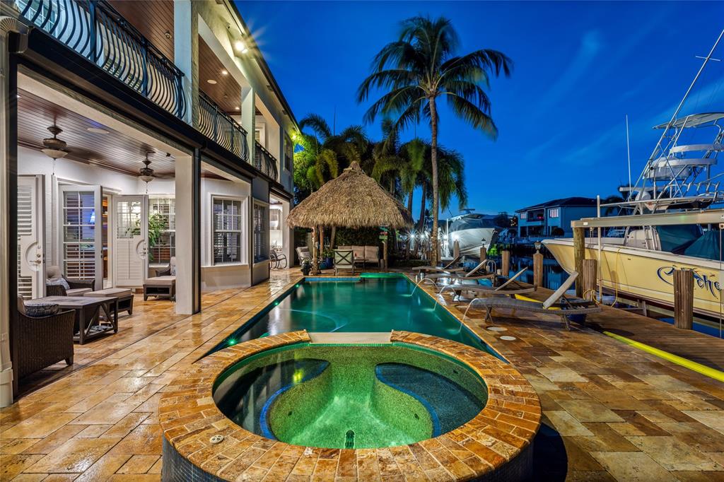 3489 Northeast 30th Avenue Lighthouse Point, FL 33064 - Photo 41 of 42 a view of swimming pool with outdoor seating and kitchen
