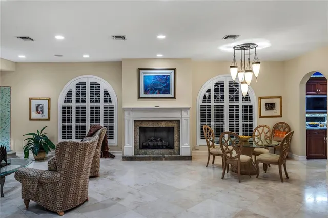 a living room with furniture rug and window