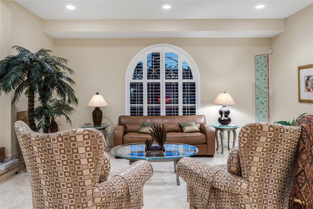 3489 Northeast 30th Avenue Lighthouse Point, FL 33064 - Photo 9 of 42 a living room with furniture rug and window