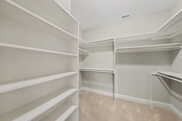 a empty closet with white paint