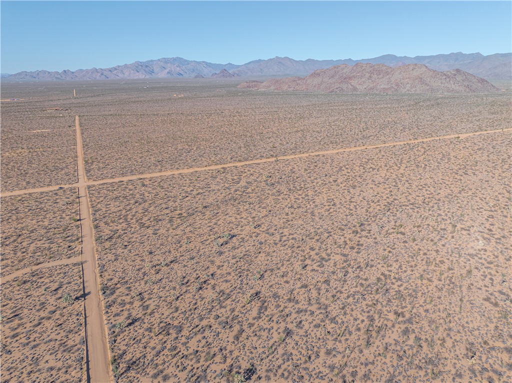 242-12-015 South Sundance Kid Road Yucca, AZ 86438 - Photo 20 of 21 a view of a terrace with mountain view