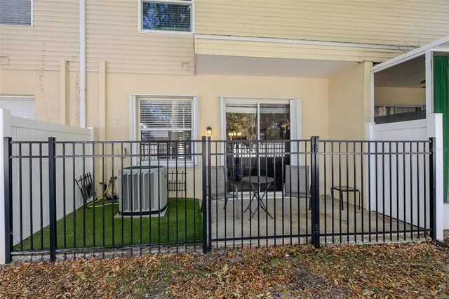 a view of a brick house having balcony
