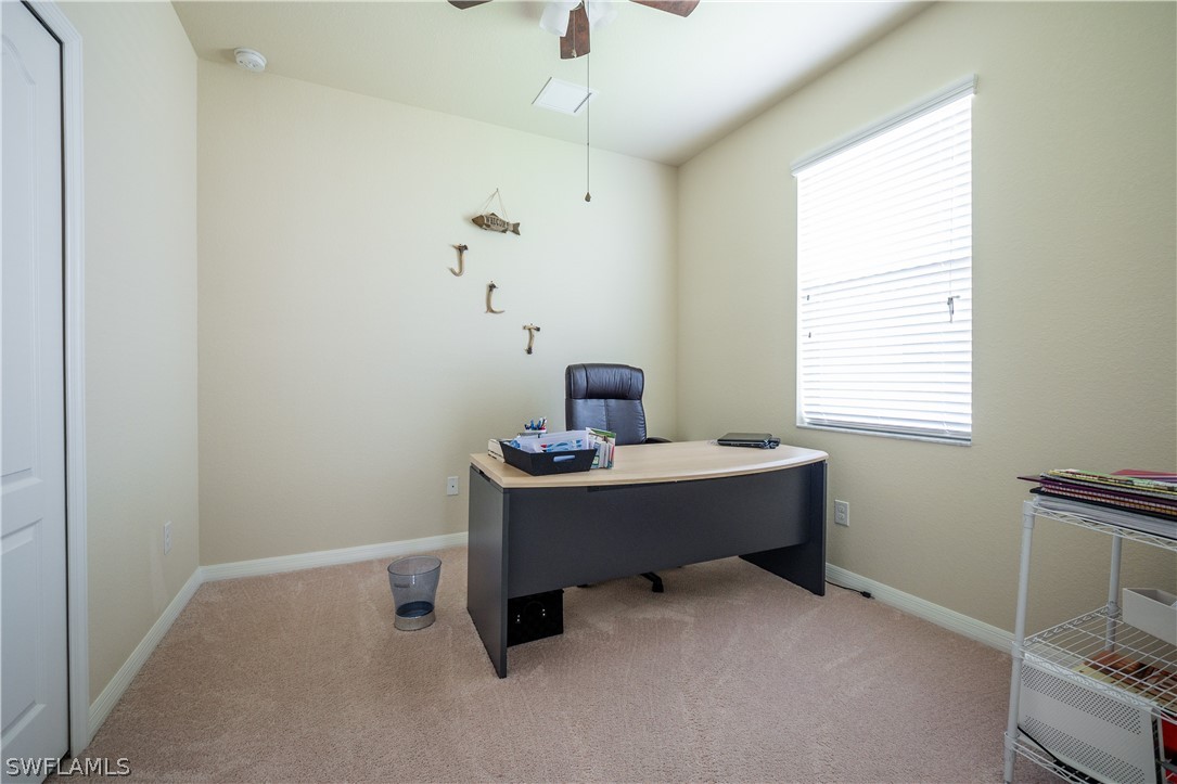11677 Eros Road Lehigh Acres, FL 33971 - Photo 10 of 27 a room with a window