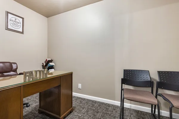 a room with a table and chair