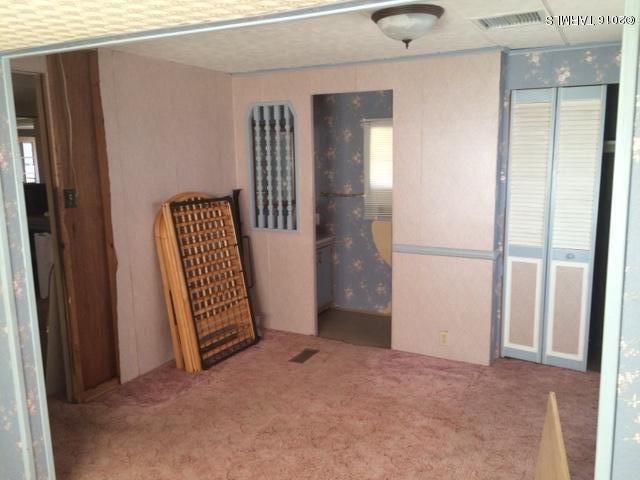 331 North Pima Benson, AZ 85602 - Photo 6 of 7 an empty room with windows