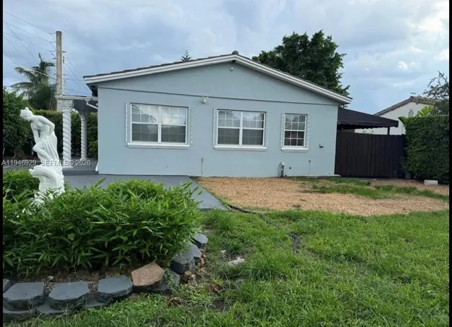 a house that has a lot of plants in it